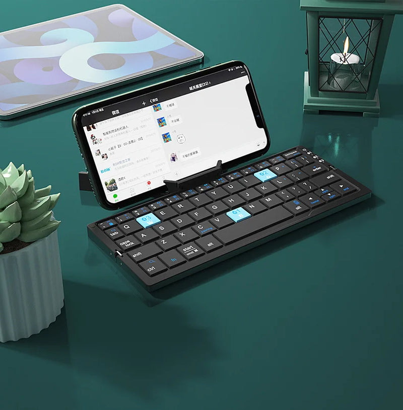 Revolutionary Compact 3-Device Bluetooth Mini Folding Keyboard with Integrated Stand - Ultimate Rechargeable Wireless Keypad for Your Phones and Tablets