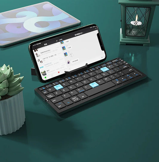 Revolutionary Compact 3-Device Bluetooth Mini Folding Keyboard with Integrated Stand - Ultimate Rechargeable Wireless Keypad for Your Phones and Tablets